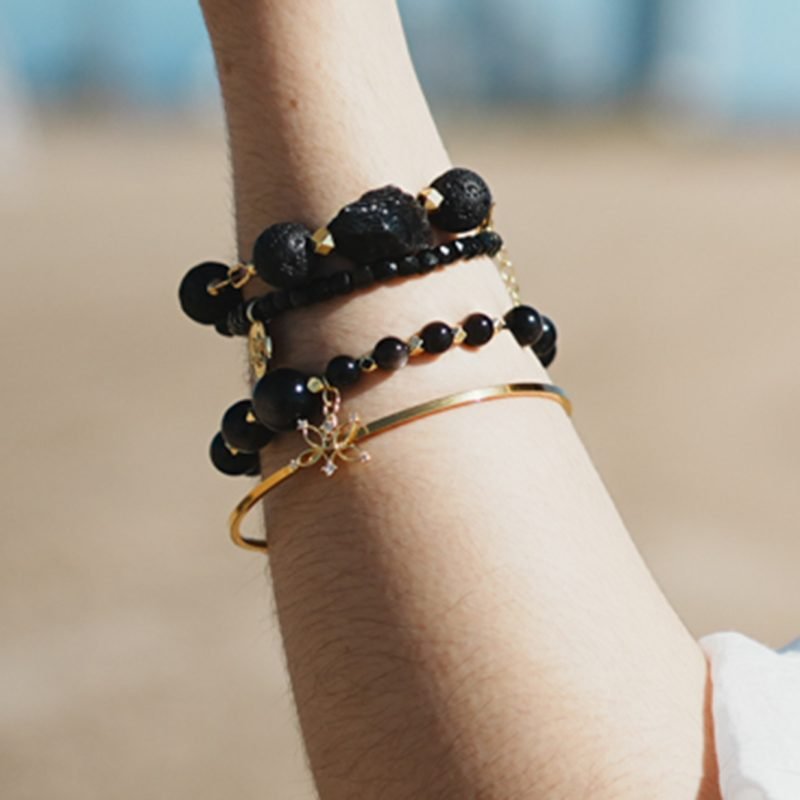 Grounding Jewelry: 5 Powerful Stones to Find Calm in Chaos 1 Grounding jewelry connecting with nature energy